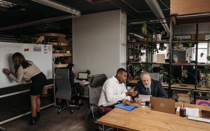 Team optimizing marketing strategy