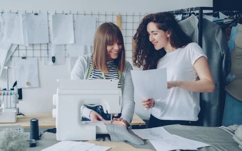 Service business owners working in their studio